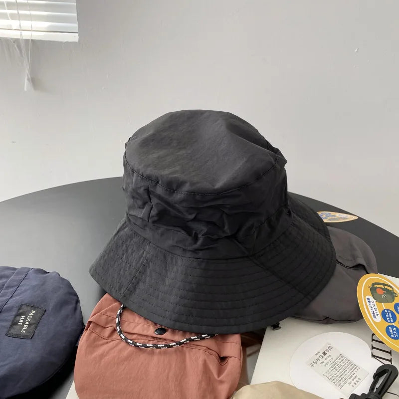 Chapeau pluie pliable pratique voyage